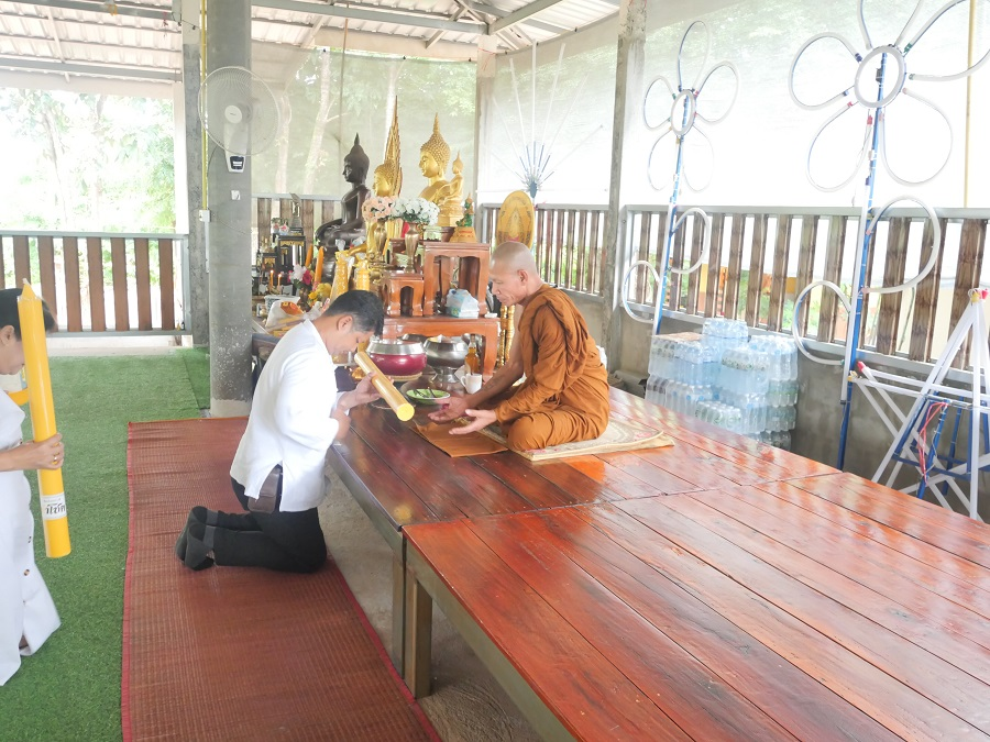 โครการส่งเสริมกิจกรรมทางศาสนา" (ถวายเทียนพรรษา)